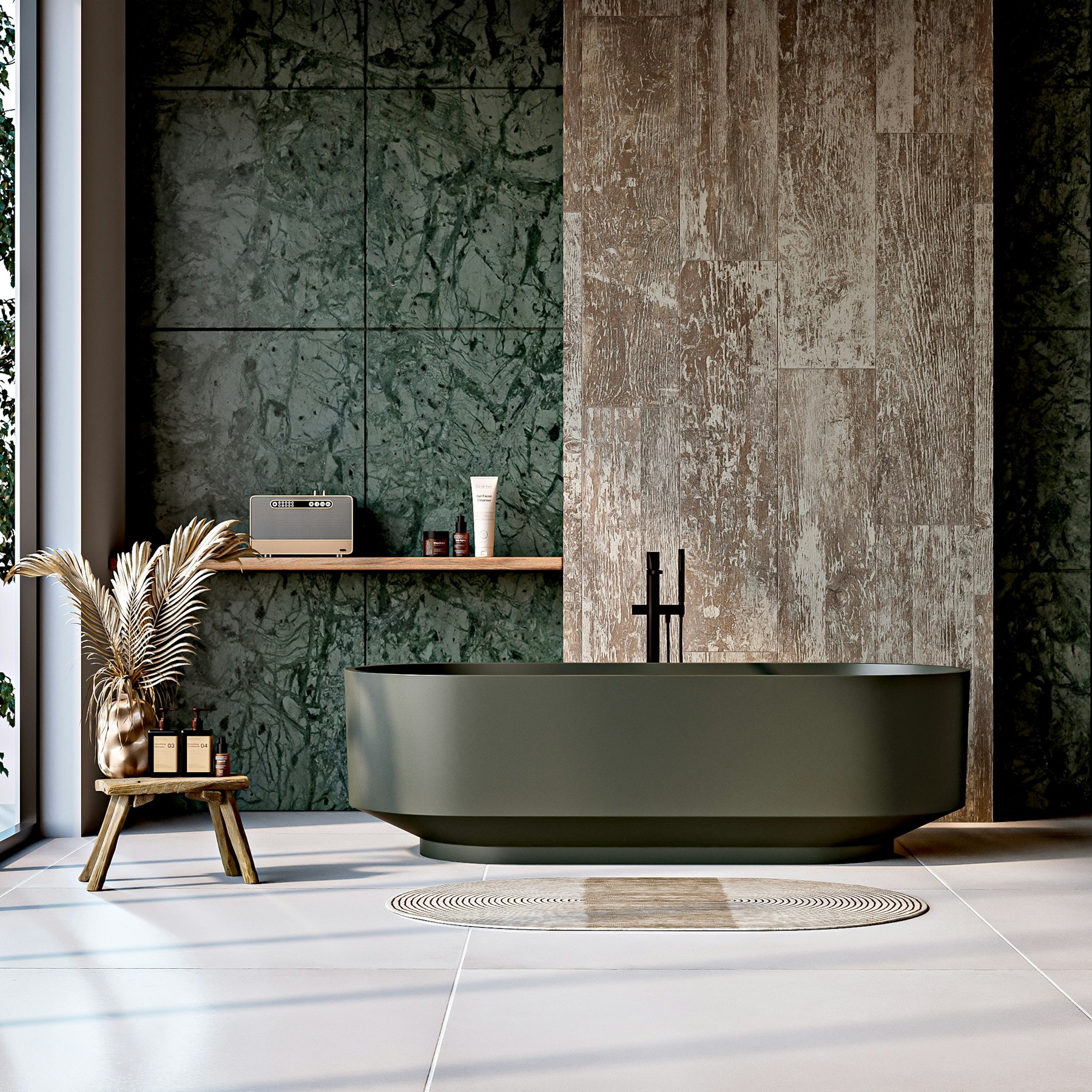 Bathroom with green marble tile, stone walls and a sculptural soaking tub